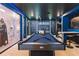 Entertaining game room with a pool table, bar seating, and immersive Star Wars-themed decor at 2123 Lelani Cir, Davenport, FL 33897
