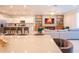 Open concept living area featuring modern furnishings and plenty of lighting at 2123 Lelani Cir, Davenport, FL 33897