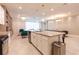 Bright open floor plan featuring a kitchen, living room, and dining area at 2123 Lelani Cir, Davenport, FL 33897