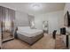 Serene main bedroom with elegant decor, mirrored nightstands, and soft lighting at 2123 Lelani Cir, Davenport, FL 33897