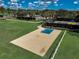 Aerial view of the community basketball court in a well-maintained outdoor recreation area at 223 Silver Maple Rd, Groveland, FL 34736