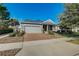 Lovely single-Gathering home with a brick driveway, manicured lawn, and inviting facade at 223 Silver Maple Rd, Groveland, FL 34736