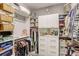 Organized walk-in closet with shelving, drawers, and hanging rods for ample storage at 223 Silver Maple Rd, Groveland, FL 34736