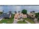 Stunning lakefront home with private dock, lush lawn, and beautiful landscaping at 2501 Trentwood Blvd, Belle Isle, FL 32812