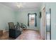 Bedroom featuring a window, ceiling fan, and TV at 2501 Trentwood Blvd, Belle Isle, FL 32812