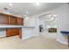 Open basement featuring a wet bar, wine rack, and entertainment area with comfortable seating at 25519 Hawks Run Ln, Sorrento, FL 32776