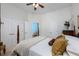 Spacious bedroom featuring neutral walls, multiple closets, and a doorway leading to a sitting area at 25519 Hawks Run Ln, Sorrento, FL 32776