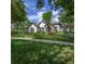 Gorgeous single Gathering home with a lush lawn, stone accents, and a tile roof at 25519 Hawks Run Ln, Sorrento, FL 32776