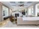 Comfortable living room showcasing a fireplace, large windows, and stylish decor at 25519 Hawks Run Ln, Sorrento, FL 32776