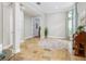 Open office with travertine tile flooring, neutral paint, and a built-in desk at 25519 Hawks Run Ln, Sorrento, FL 32776
