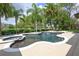 Beautiful pool area with lush landscaping, a spa, and ample space for outdoor relaxation and entertaining at 25519 Hawks Run Ln, Sorrento, FL 32776