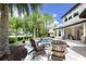 Backyard featuring a custom pool with a spa, manicured landscaping, and outdoor seating areas at 25519 Hawks Run Ln, Sorrento, FL 32776