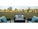 Spacious backyard with outdoor seating and views of neighborhood homes at 2825 Muller Oak Loop, Ocoee, FL 34761