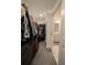 Spacious walk-in closet with custom shelving and organization systems at 2825 Muller Oak Loop, Ocoee, FL 34761