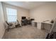 Office space features a desk, chair, computer, sewing machine, and exercise equipment at 2825 Muller Oak Loop, Ocoee, FL 34761