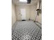Spacious garage with a geometric rug is ready for customization and vehicle storage at 3181 Capri Isle Way, Orlando, FL 32835