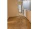 Hallway with neutral carpet leads to other rooms, providing a smooth transition between living spaces at 3181 Capri Isle Way, Orlando, FL 32835