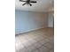 Open living room with neutral paint and tile flooring at 3181 Capri Isle Way, Orlando, FL 32835