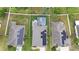 Aerial view of house showcasing a pool and solar panels on the roof at 3505 Rhapsody St, St Cloud, FL 34772