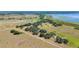 Panoramic aerial view of lush acreage featuring lakes and scattered trees at 3650 Lake Tohopekaliga Rd, St Cloud, FL 34772