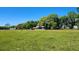 Expansive lot with mature trees and grass area surrounding property at 3650 Lake Tohopekaliga Rd, St Cloud, FL 34772