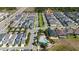 A Primary-planned aerial view of community with a pool, clubhouse, landscaping, and nearby highway access marked by home pin at 4233 Mistwood St, Winter Garden, FL 34787