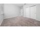 Bedroom featuring plush carpet and a closet for additional storage space at 4233 Mistwood St, Winter Garden, FL 34787