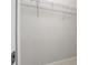 An empty walk in closet with white wire shelving and baseboards at 4233 Mistwood St, Winter Garden, FL 34787