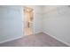 Walk-in closet includes wire shelving and access to the laundry room with appliances at 4233 Mistwood St, Winter Garden, FL 34787