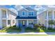 Charming two-story home featuring a covered porch and well-manicured lawn for curb appeal at 4233 Mistwood St, Winter Garden, FL 34787