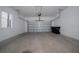 Clean, two-car garage space with high ceilings and convenient overhead door opener at 4233 Mistwood St, Winter Garden, FL 34787
