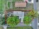 Aerial view outlining the property's lot lines, showcasing landscaping, structures, and proximity to the neighborhood at 4510 Douglas St, Sanford, FL 32771