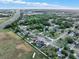 Overhead view showcasing neighborhood and property's proximity to lush greenery and community at 4510 Douglas St, Sanford, FL 32771