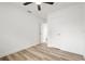 Neutral bedroom with wood-look flooring provides a blank canvas for personalization and relaxation at 4510 Douglas St, Sanford, FL 32771