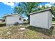 Backyard featuring two shed style buildings at 4510 Douglas St, Sanford, FL 32771