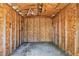 Inside view of the shed featuring exposed wood framing and a concrete floor at 4510 Douglas St, Sanford, FL 32771