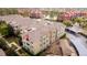 Aerial view of a multi-story building with red pin on a balcony at 4897 Cypress Woods Dr # 6314, Orlando, FL 32811