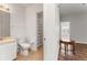 Cozy bathroom leads into the bedroom and features a tiled floor at 4897 Cypress Woods Dr # 6314, Orlando, FL 32811