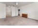 Large bedroom with ceiling fan, neutral carpet and dresser at 4897 Cypress Woods Dr # 6314, Orlando, FL 32811