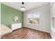 Dining room features a decorative green wall and view from the windows at 4897 Cypress Woods Dr # 6314, Orlando, FL 32811