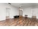 Open-concept living area with modern flooring, neutral walls, and plenty of space for entertaining at 4897 Cypress Woods Dr # 6314, Orlando, FL 32811