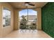 Relaxing balcony with a table and chairs, screened view, and decorative plants at 4897 Cypress Woods Dr # 6314, Orlando, FL 32811