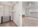 Walk-in closet leading to a spacious bedroom with neutral carpet at 4897 Cypress Woods Dr # 6314, Orlando, FL 32811