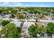 Aerial view of the property showcasing the surrounding neighborhood and ample greenery at 4908 Keith Pl, Orlando, FL 32808