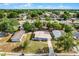 Aerial view of the home showcasing the surrounding neighborhood and tree coverage at 4908 Keith Pl, Orlando, FL 32808