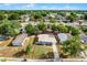 Aerial shot showing a single Gathering house with well-maintained lawn in a vibrant neighborhood outlined in red at 4908 Keith Pl, Orlando, FL 32808