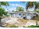 Home exterior with tidy yard, siding, and landscaping at 4908 Keith Pl, Orlando, FL 32808
