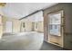 Spacious garage with concrete floors, multiple windows, and access to the outside at 4908 Keith Pl, Orlando, FL 32808
