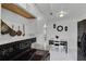 Kitchen featuring a dining table and chairs, and white tiled floors at 4908 Keith Pl, Orlando, FL 32808