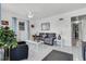 Bright living room with neutral tones, tiled floors, and comfortable seating at 4908 Keith Pl, Orlando, FL 32808